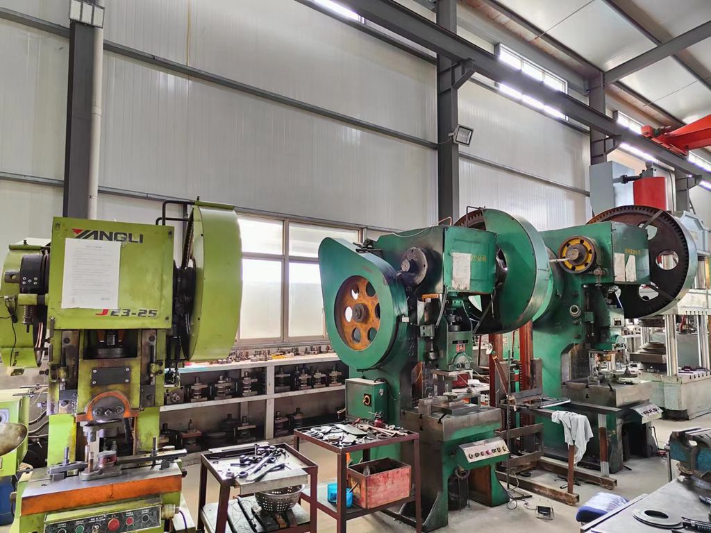 Forming and pressing equipment for disc spring production